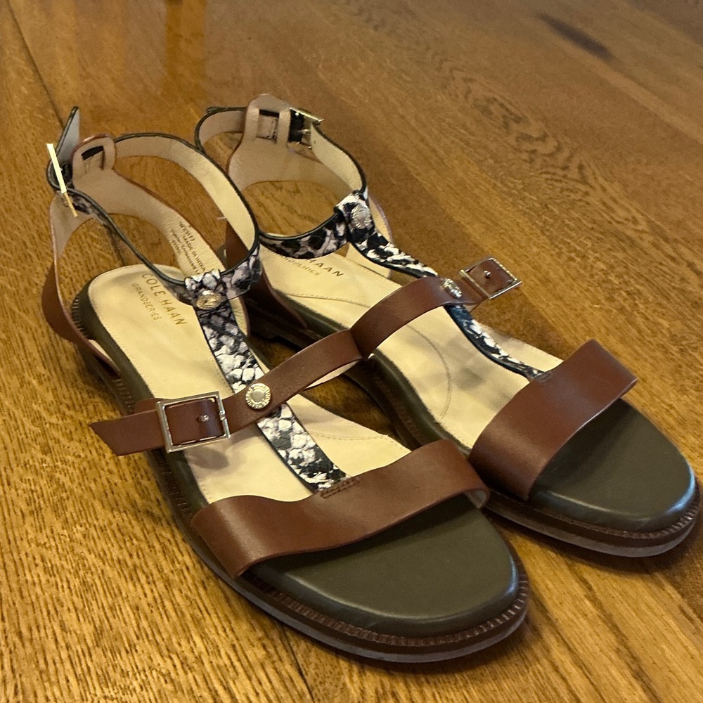 Woman’s Cole Haan brown leather and embossed snake skin sandal. Size 8. Like new